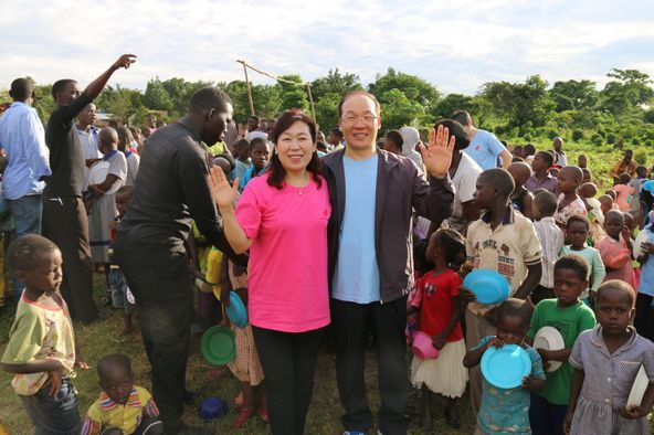 Pastor Yong-Doo Kim's wife Hyun-ja Kang (left) & Pastor Yong-Doo Kim (right), when they were on a mission trip to Uganda, Africa.